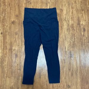 Athleta Leggings. Size medium. Salutation Stash Pocket II 7/8 Tight. Navy Blue.